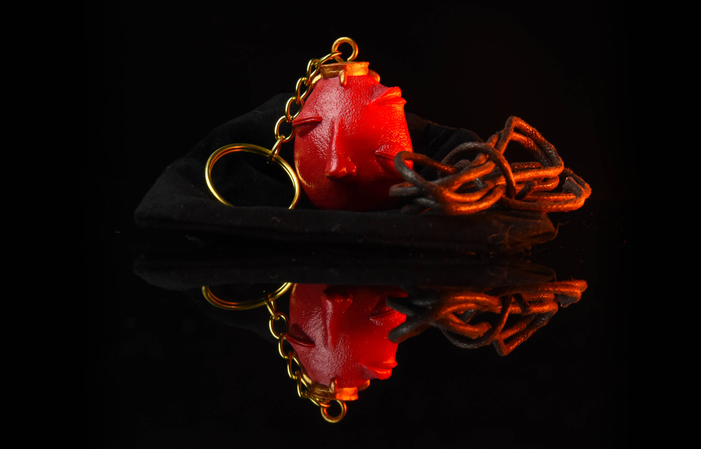 Behelit keychain / pendant