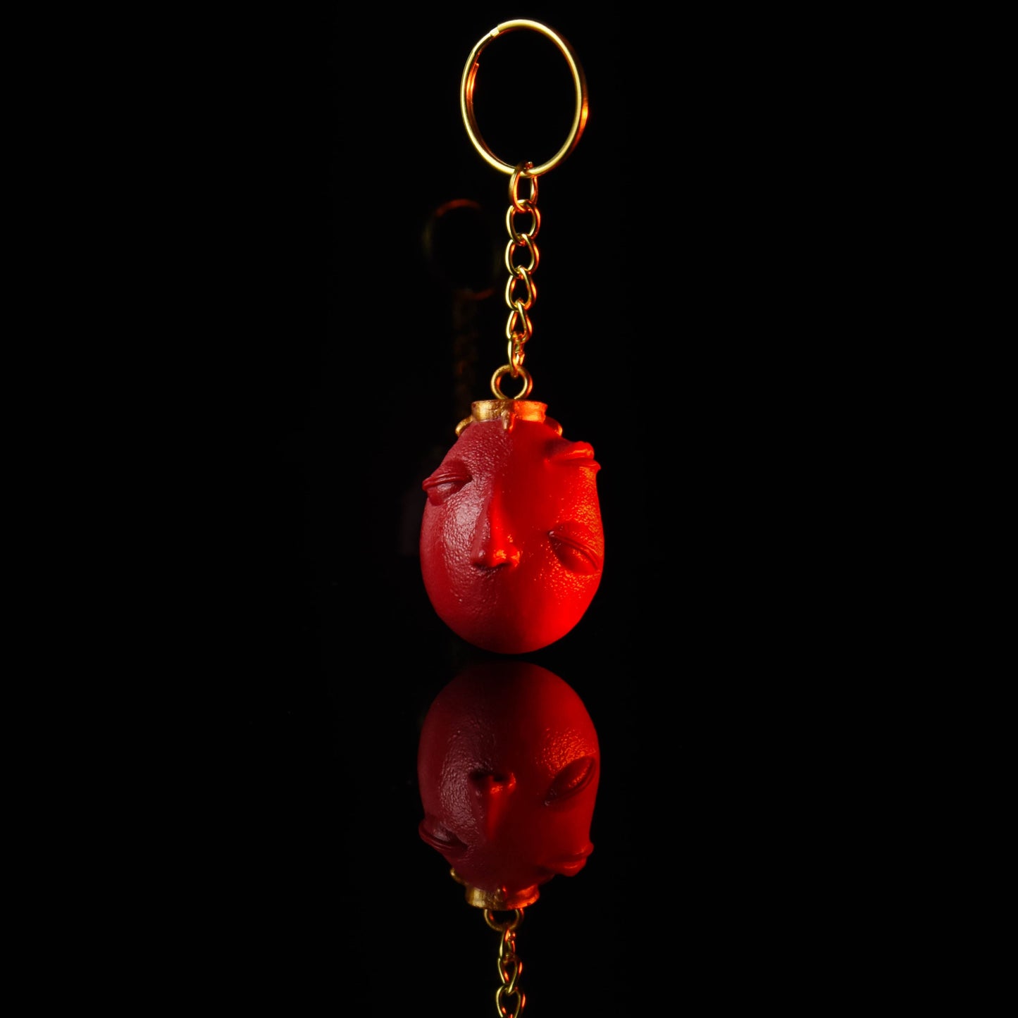 Behelit keychain / pendant