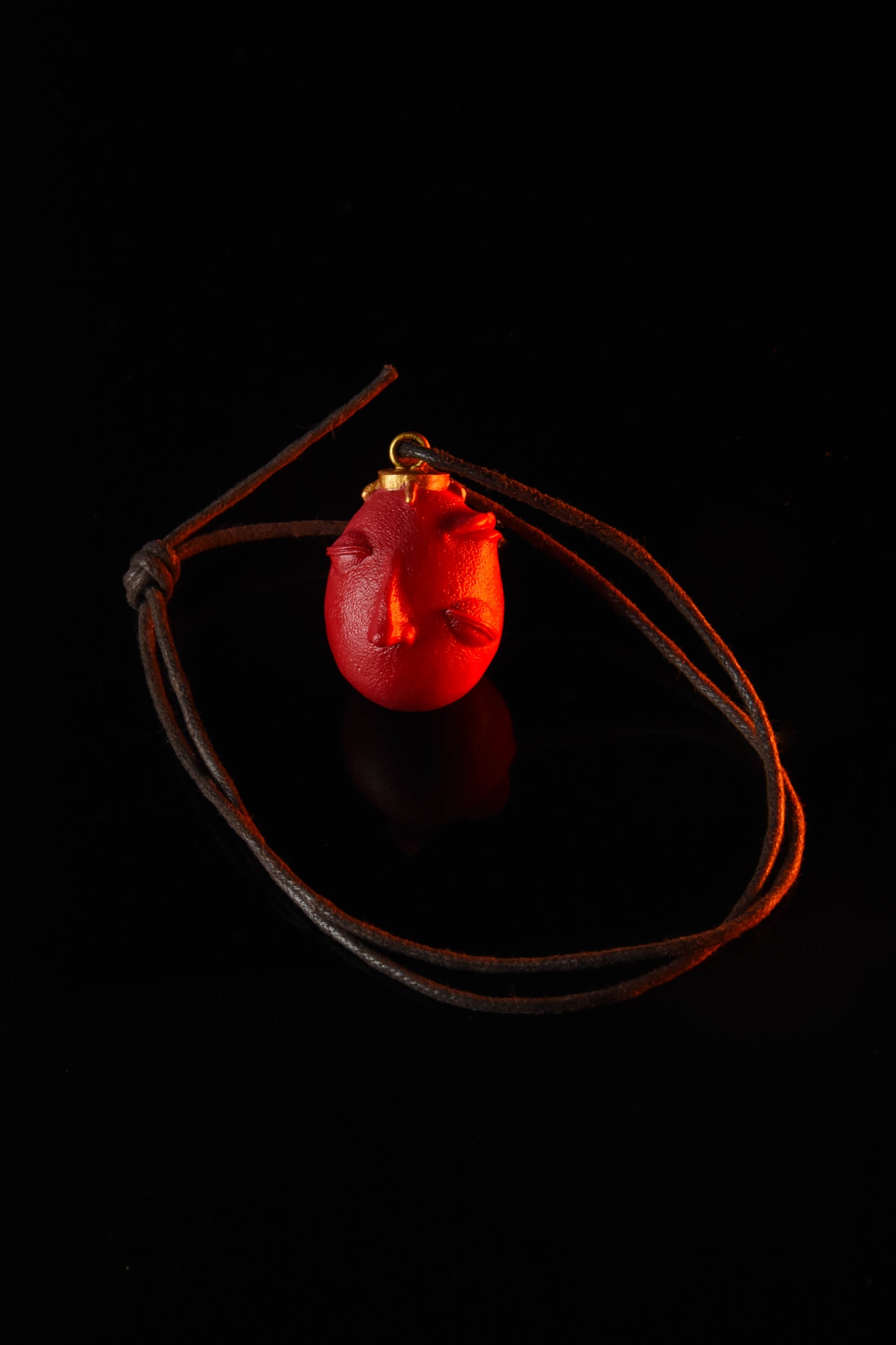 Behelit keychain / pendant